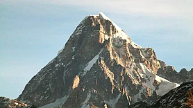 Mountain peak with dramatic sky